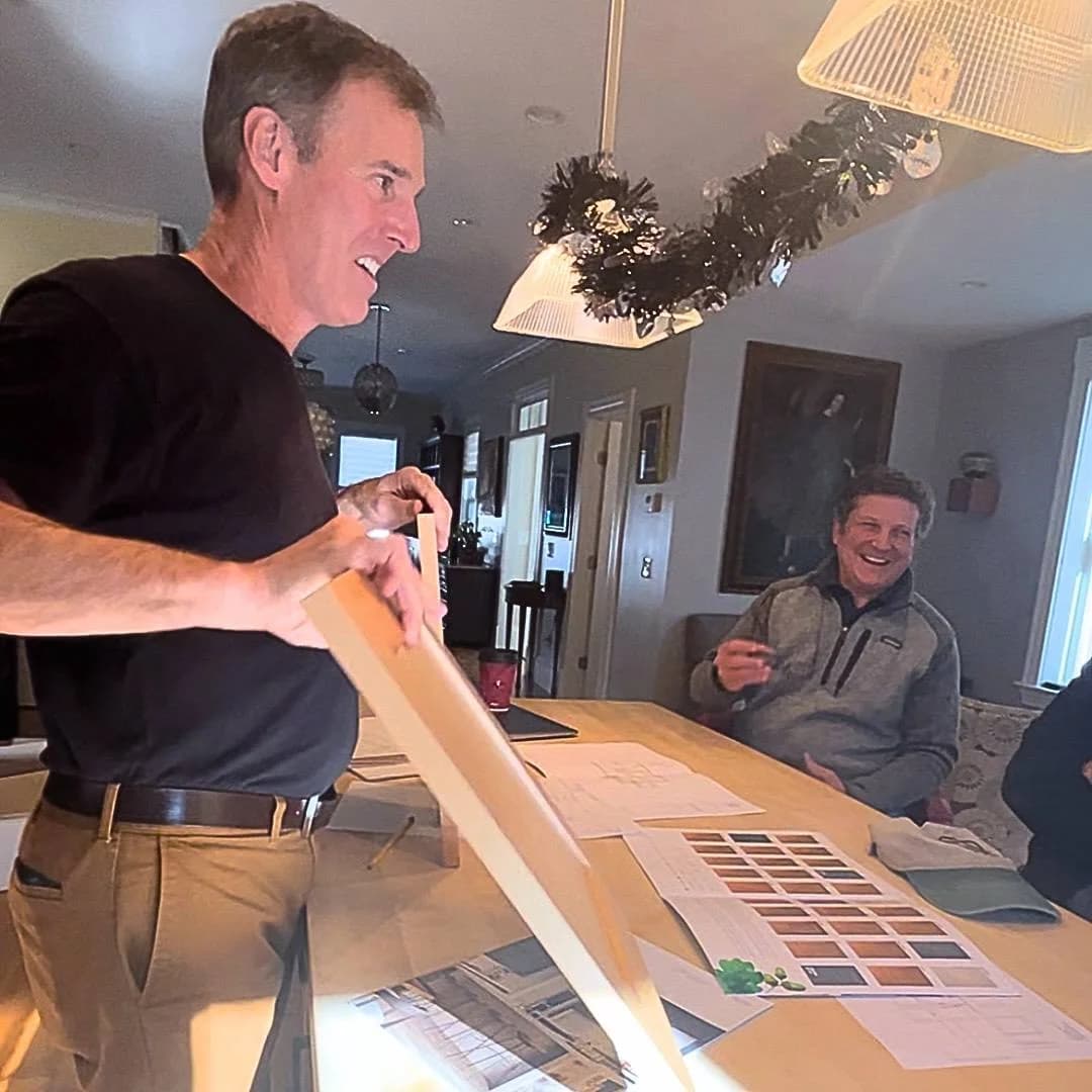 Bill Garrison reviewing cabinet samples with a client